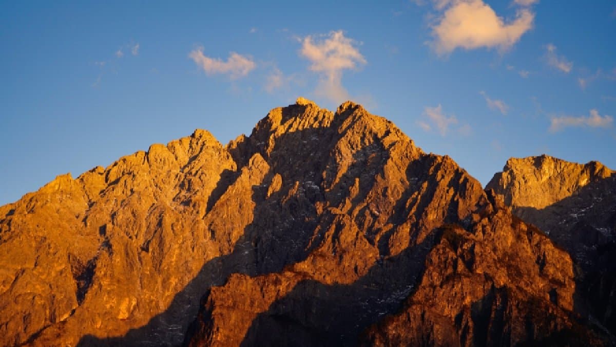 Golden sunset light on Jade Dragon Snow Mountain from Tiger Leaping Gorge