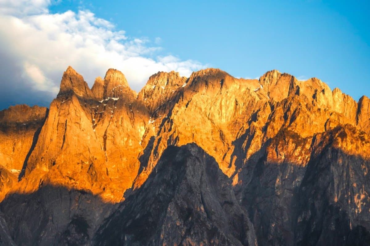 Trail through alpine pastures near Haba Village