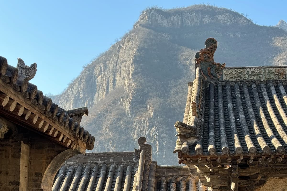 Dragon Gate Temple nestled in mountains along the Zhuo Zhang River valley