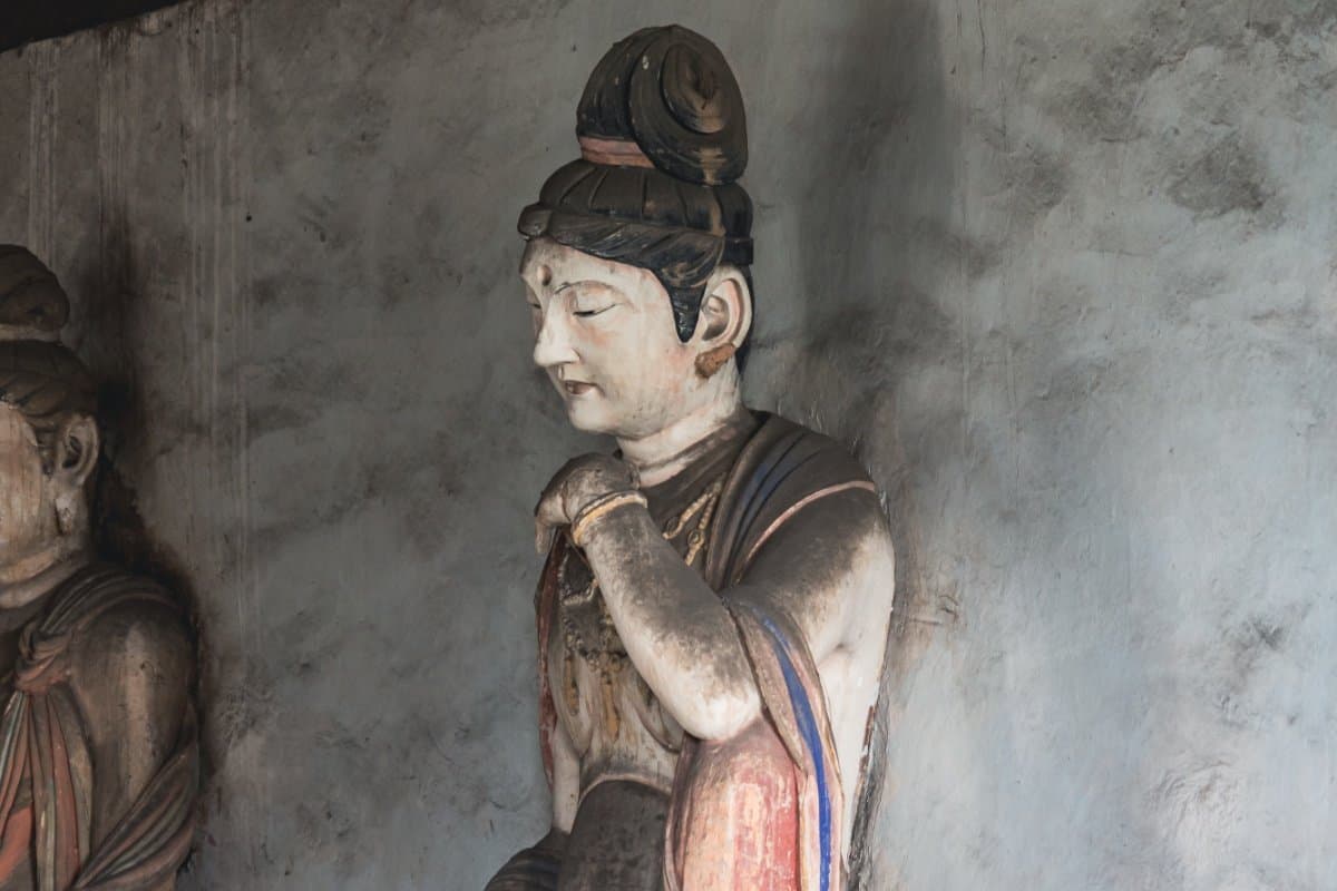 Song dynasty Twelve Enlightened Ones sculptures inside Faxing Temple